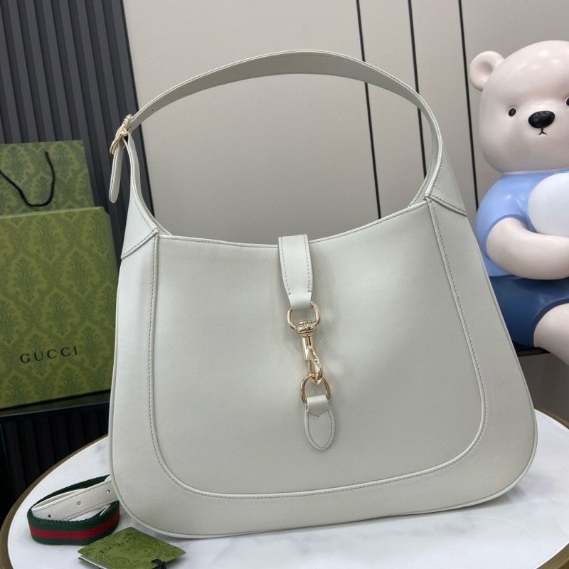 G*u*i top handle bags